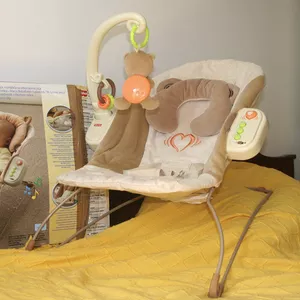 Кресло-качалка Fisher Price c сердцебиением для младенцев.